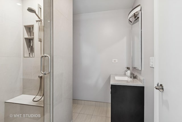 1140 Catalpa Ln, Naperville, IL 60540 - bathroom with a tile shower, vanity, and tile patterned floors