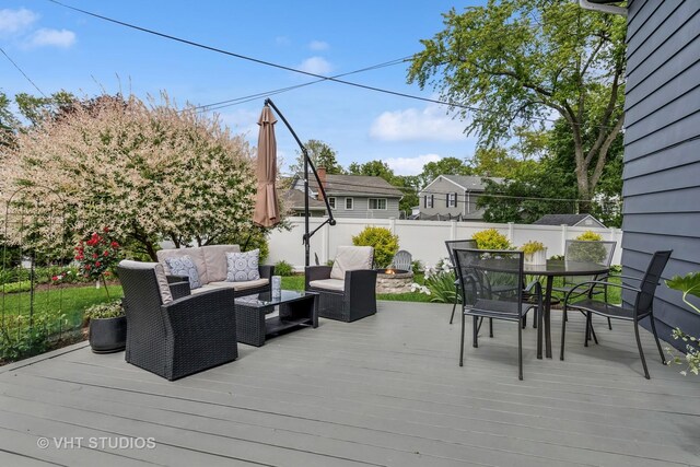 1140 Catalpa Ln, Naperville, IL 60540 - deck featuring an outdoor living space with a fire pit, a fenced backyard, and outdoor dining space
