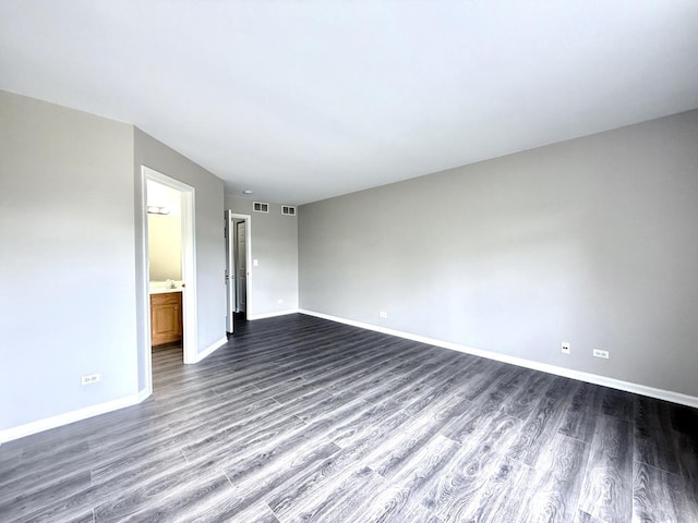 4078 Boulder Ct, Aurora, IL 60504 - unfurnished room featuring dark wood-style floors and baseboards