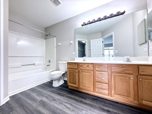 4078 Boulder Ct, Aurora, IL 60504 - full bath with double vanity, bathing tub / shower combination, wood finished floors, and toilet