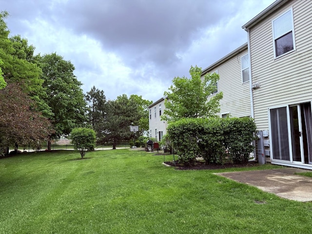 4078 Boulder Ct, Aurora, IL 60504 - view of green lawn with a patio area