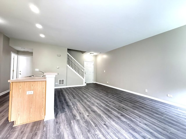 4078 Boulder Ct, Aurora, IL 60504 - unfurnished living room with dark wood-style floors, baseboards, stairway, and recessed lighting