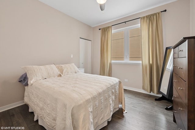 3019 N Allen Ave, Chicago, IL 60618 - bedroom featuring baseboards, dark wood-type flooring, multiple windows, and a ceiling fan