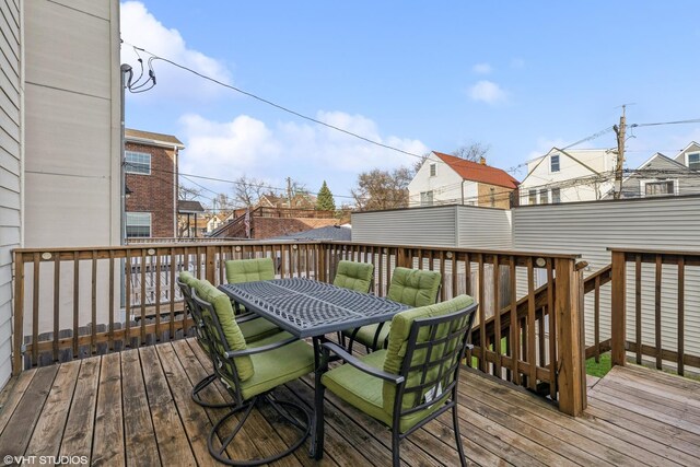 3019 N Allen Ave, Chicago, IL 60618 - wooden deck with outdoor dining area and a residential view