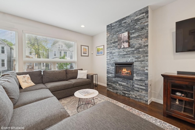 3019 N Allen Ave, Chicago, IL 60618 - living area featuring wood finished floors, baseboards, a fireplace, and recessed lighting