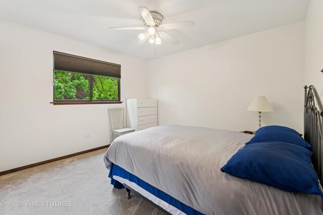 1809 Grant St, Evanston, IL 60201 - carpeted bedroom with baseboards and ceiling fan