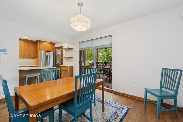 1809 Grant St, Evanston, IL 60201 - dining area with hardwood / wood-style flooring and baseboards