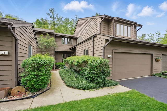 36 Lakewood Cir, Saint Charles, IL 60174 - view of home's exterior featuring driveway and a garage