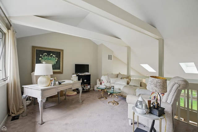36 Lakewood Cir, Saint Charles, IL 60174 - carpeted living area with a skylight and vaulted ceiling