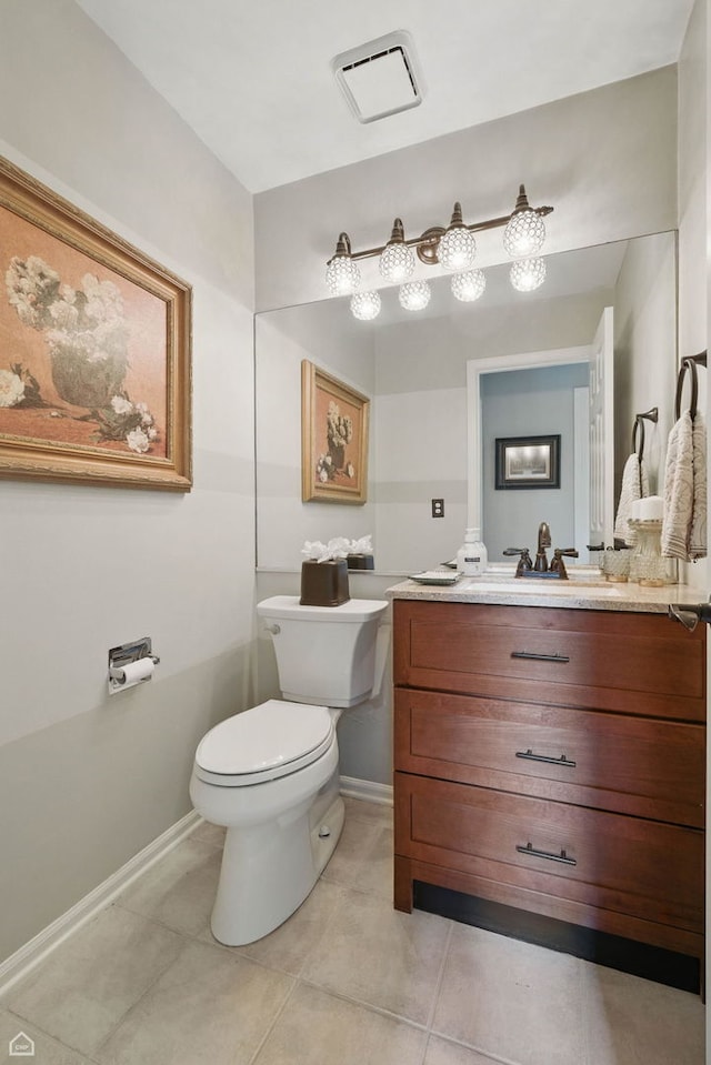 36 Lakewood Cir, Saint Charles, IL 60174 - half bathroom featuring toilet, vanity, tile patterned floors, and baseboards