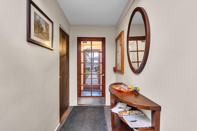 7204 Oak Ave Unit 1Nw, River Forest, IL 60305 - doorway to outside with baseboards and dark colored carpet