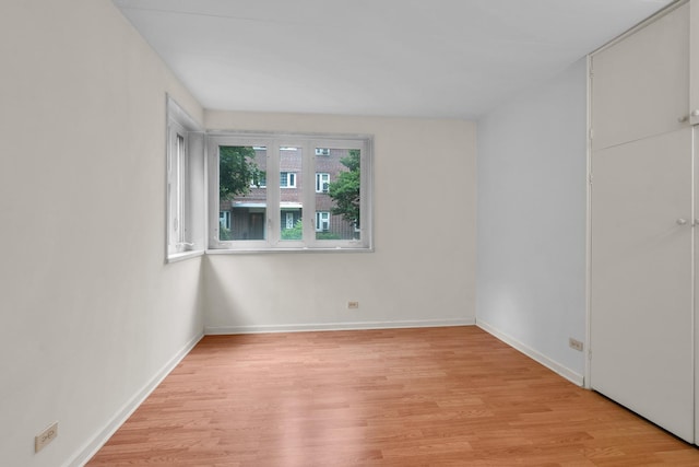 7204 Oak Ave Unit 1Nw, River Forest, IL 60305 - spare room with light wood finished floors and baseboards