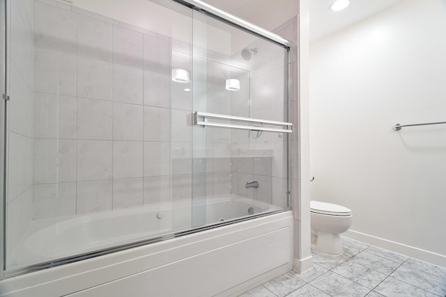 737 W Washington Blvd Unit 2702, Chicago, IL 60661 - full bathroom with combined bath / shower with glass door, toilet, and baseboards