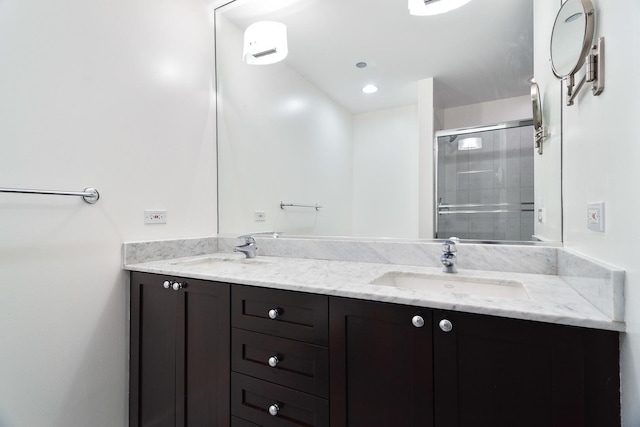 737 W Washington Blvd Unit 2702, Chicago, IL 60661 - bathroom featuring a shower stall and double vanity