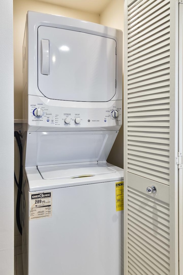 737 W Washington Blvd Unit 2702, Chicago, IL 60661 - washroom with stacked washing machine and dryer