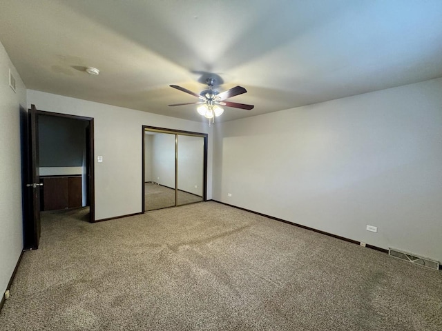 18013 Park Ave, Lansing, IL 60438 - unfurnished bedroom featuring carpet, a closet, baseboards, and a ceiling fan