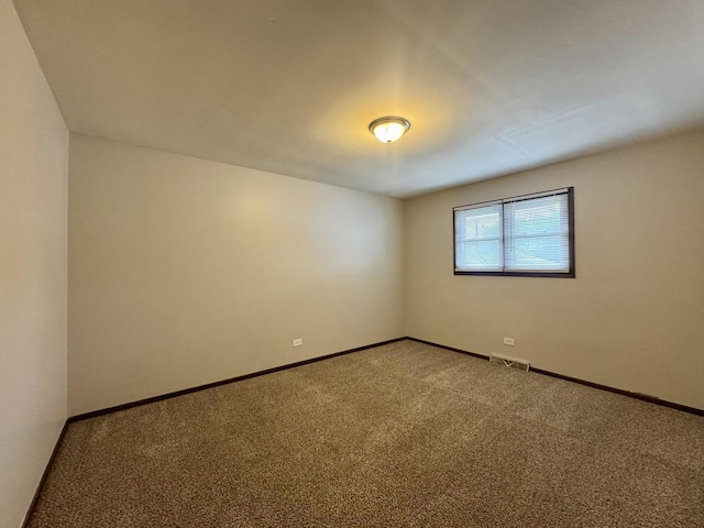 18013 Park Ave, Lansing, IL 60438 - carpeted spare room with baseboards