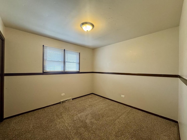 18013 Park Ave, Lansing, IL 60438 - empty room featuring carpet flooring and baseboards