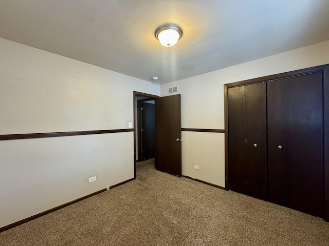 18013 Park Ave, Lansing, IL 60438 - unfurnished bedroom with light carpet, baseboards, and a closet