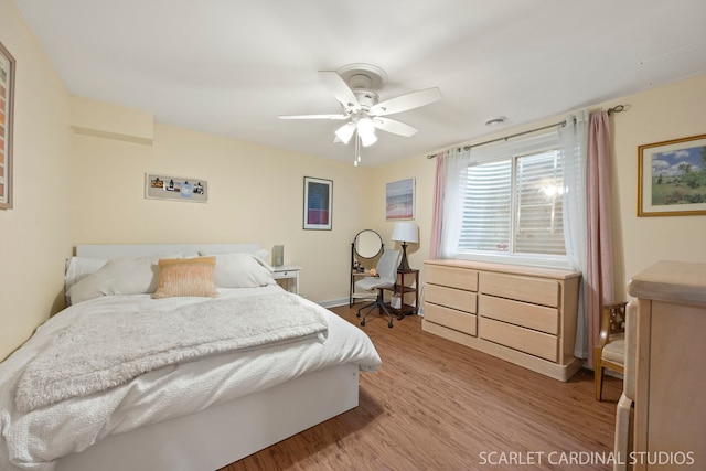 203 E Lincoln Ave, Wheaton, IL 60187 - bedroom with light wood finished floors, baseboards, and ceiling fan