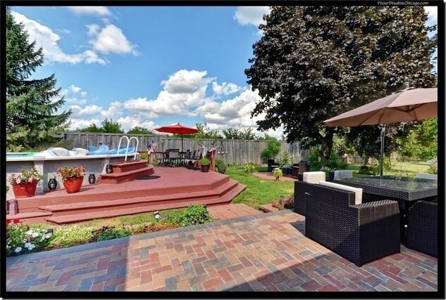 510 W Millns Ct, Addison, IL 60101 - deck featuring outdoor dining area, a fenced backyard, and a patio area