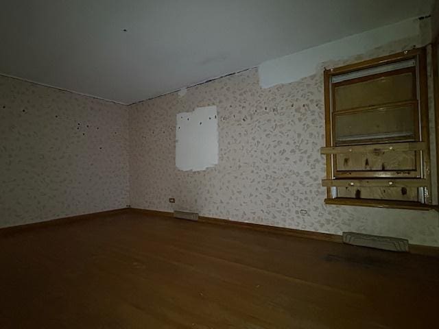 2311 N Natchez Ave, Chicago, IL 60707 - spare room with wood finished floors