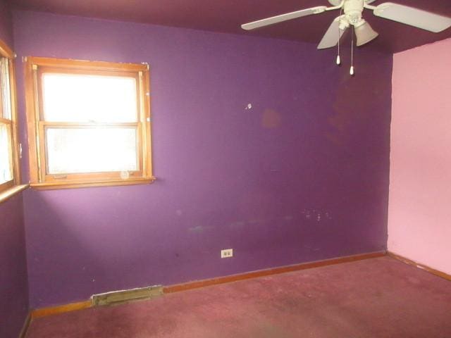 2311 N Natchez Ave, Chicago, IL 60707 - empty room featuring a ceiling fan, baseboards, and carpet floors