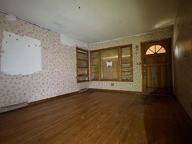 2311 N Natchez Ave, Chicago, IL 60707 - entrance foyer with wallpapered walls, wood finished floors, a baseboard heating unit, and baseboards
