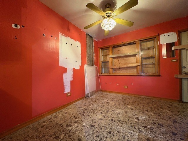 2311 N Natchez Ave, Chicago, IL 60707 - unfurnished room with a ceiling fan