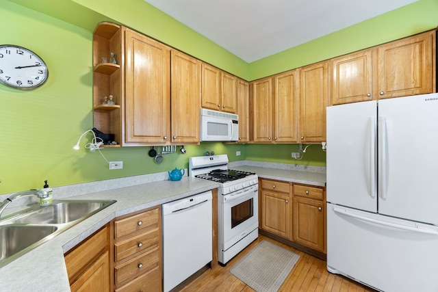 3300 Grove Ave Unit 3S, Berwyn, IL 60402 - kitchen with white appliances, open shelves, a sink, light countertops, and light wood-type flooring