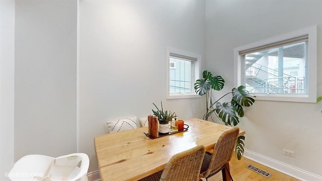 1508 Elmwood Ave Unit 3, Evanston, IL 60201 - dining space featuring baseboards and light wood-style flooring