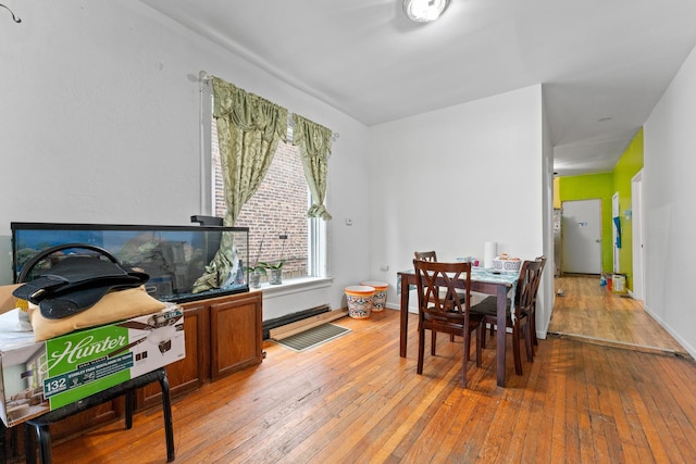 4947 W Huron St, Chicago, IL 60644 - dining room featuring hardwood / wood-style floors