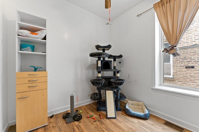 4947 W Huron St, Chicago, IL 60644 - workout room with wood finished floors and baseboards