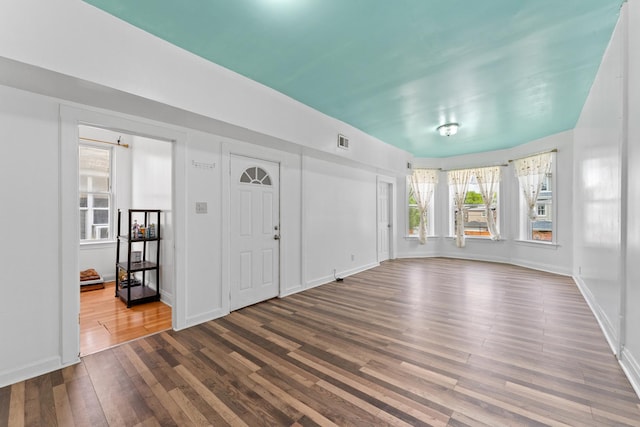 4947 W Huron St, Chicago, IL 60644 - foyer entrance with dark wood-style flooring and baseboards