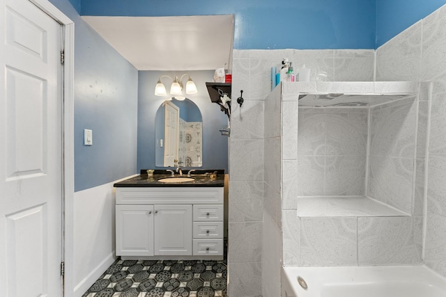 4947 W Huron St, Chicago, IL 60644 - bathroom featuring vanity, shower / washtub combination, and tile patterned floors