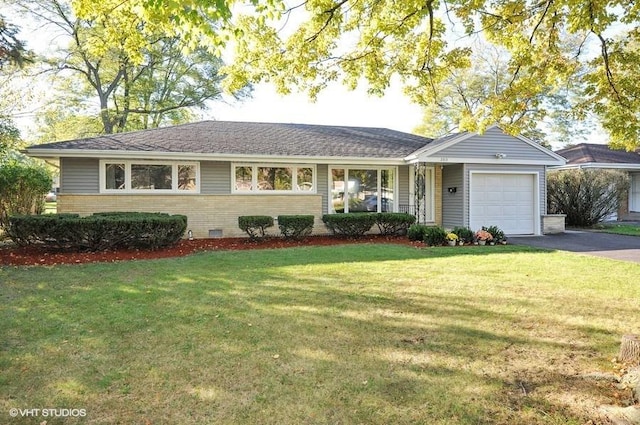 2313 Robincrest Ln, Glenview, IL 60025 - ranch-style home featuring a garage, asphalt driveway, brick siding, and a front yard