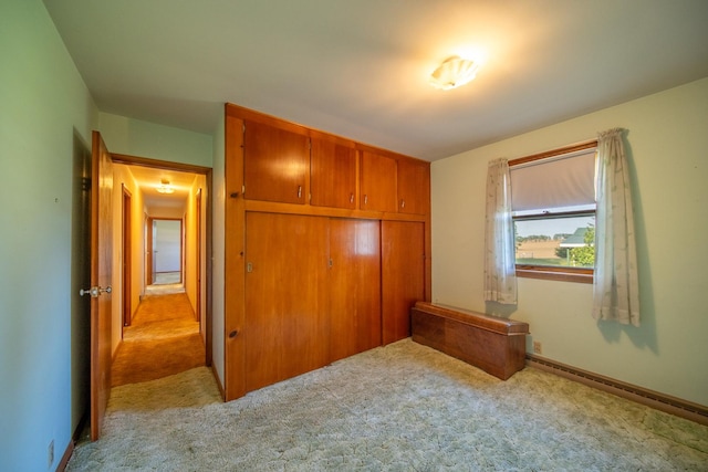 2056 Peek Home Rd, Dixon, IL 61021 - unfurnished bedroom featuring a closet and carpet floors