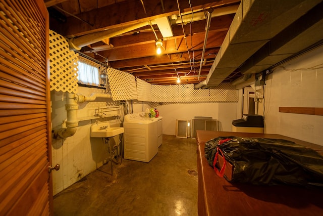 2056 Peek Home Rd, Dixon, IL 61021 - unfinished below grade area featuring a sink and washing machine and dryer