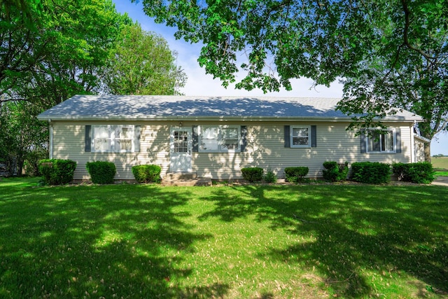 2056 Peek Home Rd, Dixon, IL 61021 - ranch-style home with a front lawn