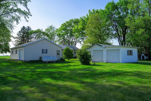 2056 Peek Home Rd, Dixon, IL 61021 - view of green lawn with an outdoor structure and a garage