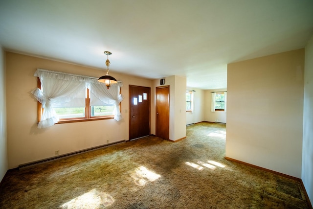 2056 Peek Home Rd, Dixon, IL 61021 - carpeted foyer entrance featuring baseboard heating and baseboards