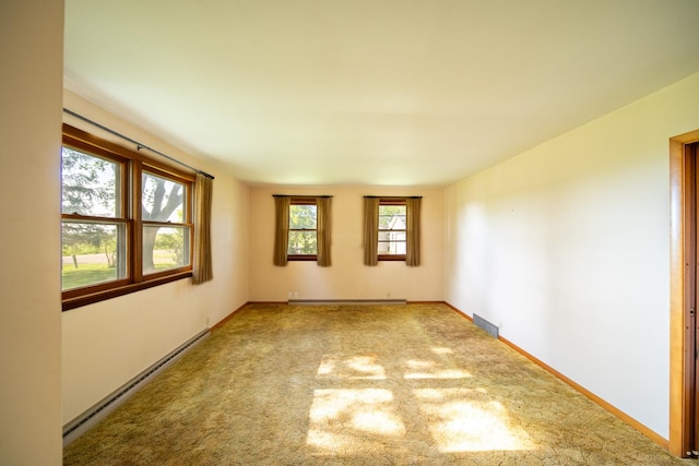 2056 Peek Home Rd, Dixon, IL 61021 - carpeted empty room with a baseboard radiator, a baseboard heating unit, and baseboards