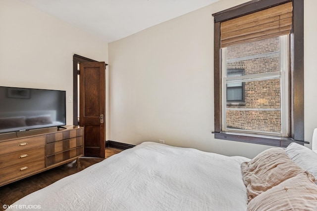 4940 N Ridgeway Ave Unit 3, Chicago, IL 60625 - bedroom with dark wood-style flooring and baseboards