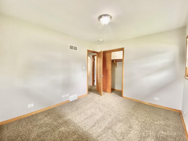664 E 163rd St, South Holland, IL 60473 - unfurnished bedroom featuring light colored carpet, baseboards, and a closet