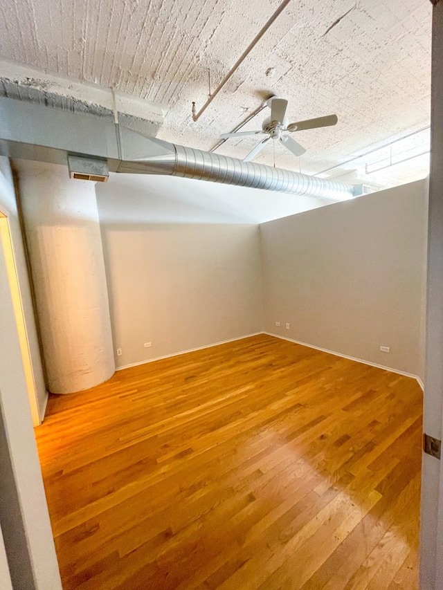 1530 S State St Unit 525, Chicago, IL 60605 - empty room with wood finished floors and ceiling fan