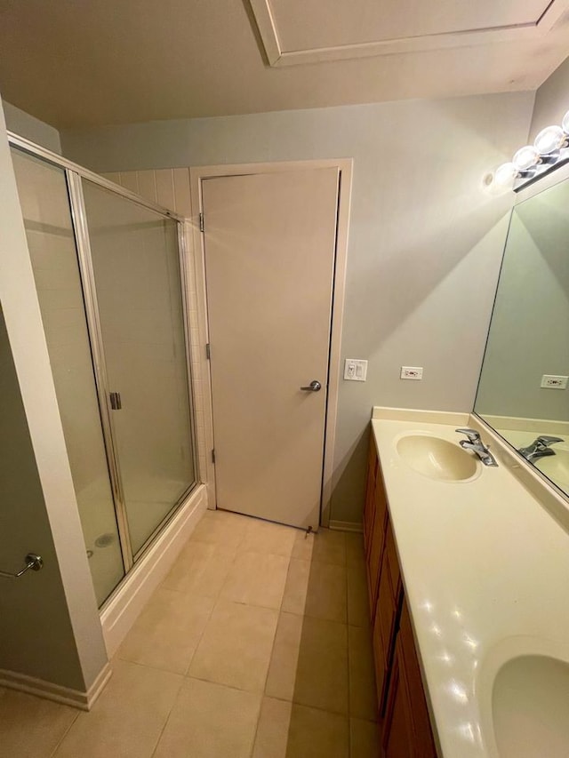 1530 S State St Unit 525, Chicago, IL 60605 - full bath with a stall shower, tile patterned flooring, and double vanity