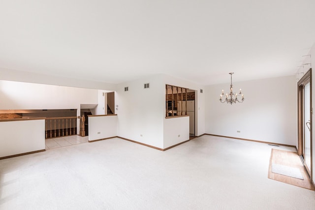 18207 Ohio Ct, Orland Park, IL 60467 - unfurnished living room with a chandelier, carpet, and baseboards
