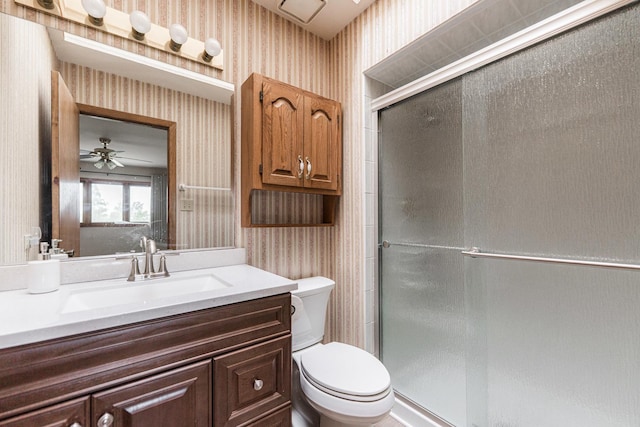 18207 Ohio Ct, Orland Park, IL 60467 - full bathroom featuring wallpapered walls, a shower stall, toilet, vanity, and a ceiling fan