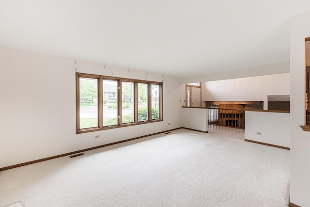 18207 Ohio Ct, Orland Park, IL 60467 - unfurnished living room featuring carpet and baseboards