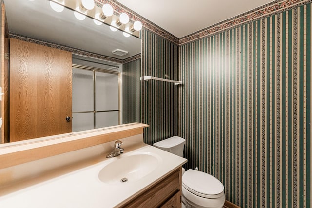 18207 Ohio Ct, Orland Park, IL 60467 - bathroom with toilet, vanity, a shower, and wallpapered walls